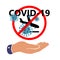 COVID-19, Novel coronavirus 2019-nCoV,  hand showing landing plane with carriers of pneumonia on Board  is crossed out with red