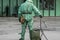 COVID-19 outbreak. Military people in bio viral hazard protective suits prepaire of chemicals for disinfection from