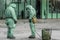 COVID-19 outbreak. Military people in bio viral hazard protective suits prepaire of chemicals for disinfection from