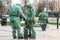 COVID-19 outbreak. Two medical workers in bio viral hazard protective suits spray of chemicals for disinfection from