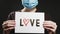 Covid-19 pandemic gratitude sign woman mask love