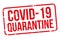 Covid-19 Quarantine red rubber stamp isolated white