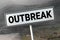 Covid-19 road and road sign with word - outbreak. Danger travel coronavirus concept