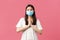 Covid-19, social distancing, virus and lifestyle concept. Hopeful cute asian girl in medical mask asking help or begging