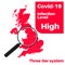 Covid-19 UK infection Level High with map and magnifying glass