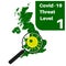 Covid-19 - UK Threat Level 1 Green with map and magnifying glass