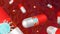 COVID-19 vaccine drug. Red and white pill is destroying red coronavirus disease. Healthcare and medical or pandemic concept. Red