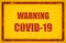 COVID-19 warning sign red text on yellow background. Coronavirus graphic design corona virus caution billboard