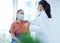 Covid, health and patient vaccine of a doctor consulting a woman in a hospital or clinic office. Healthcare consultant