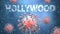 Covid and hollywood, pictured as red viruses attacking word hollywood to symbolize turmoil, global world problems and the relation