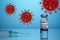 Covid Vaccine with Inoculation Syringe on Coronavirus background