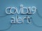 COVID19 Alert neon graphic sign with blue background mode off with red neon color