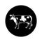The cow icon on a black background looks straight ahead. Engraved drawing sketch. For agriculture, milk and beef