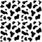 Cow skin seamless repeated pattern texture.