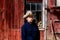 Cowboy at Barn Looking Serious