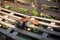 Cowboy boots on a ranch. Wood pallets. Farm