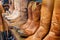 Cowboy boots on a shelf in a store aligned, closeup