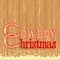 Cowboy Christmas text on wood texture background