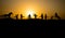 Cowboy concept. Silhouette of Cowboys at sunset time. Cowboys silhouettes on a hill with horses