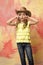 Cowboy hat on adorable girl wearing american outfit