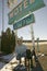 Cowboy and his dog kneel down in front of the Sands Motel Sign with RV Parking for $10, located at the intersection of Route 54 &