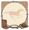 Cowboy horse equine riding tack tool in the western leather belt frame. Western boot, hat, lasso rope and galloping horse.