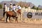 Cowboy participates in bucking horse competition