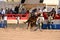 A Cowboy participates in bucking horse competition