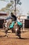 Cowboy Riding A Bucking Bull In A Rodeo