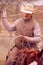 Cowboy roping calves on a cattle ranch