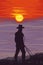 Cowboy silhouette against a blazing sunset. Hand drawn vector illustration