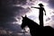 Cowboy Silhouette Standing on Horse