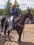 Cowboy sitting on the horse.