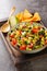 Cowboy texac caviar is a traditional American salad made with black beans, garlic, onion, bell peppers, jalapenos, corn, coriander