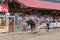 Cowboy thrown into air by bucking bull at stampede