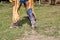 Cowboy wearing fringed leather leggings and boots