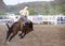 Cowboys competing in Ranch Bronc Riding