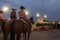 Cowboys on horseback in a rodeo at the Churchill County Fairgrounds in the city of Fallon, in the State of Nevada