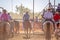 Cowboys On Horseback Watching Country Rodeo