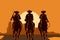 Cowboys riding horses in desert