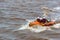 Cowes Lifeboat in action in Hull in a sunny day, Kingston upon Hull, UK