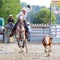 The Cowgirl in a Calf roping competition.