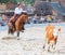 The Cowgirl in a Calf roping competition.