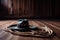 cowhide rug on wooden floor with cowboy hat and rope in the background