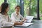 Coworker business concept, Businesswoman hold chart document to discussing project with colleague