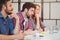 Coworkers sitting at desk in creative office