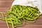 The cowpea Vigna unguiculata. Fresh long beans in reusable shopping cotton bag