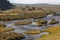 Cows cross the river. Mountain Altai, Mongolia