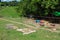 Cowsking drying in the sun and drums being produced