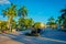 COZUMEL, MEXICO - NOVEMBER 09, 2017: Unidentified people walking and sitting in a public chairs in a park in enjoying